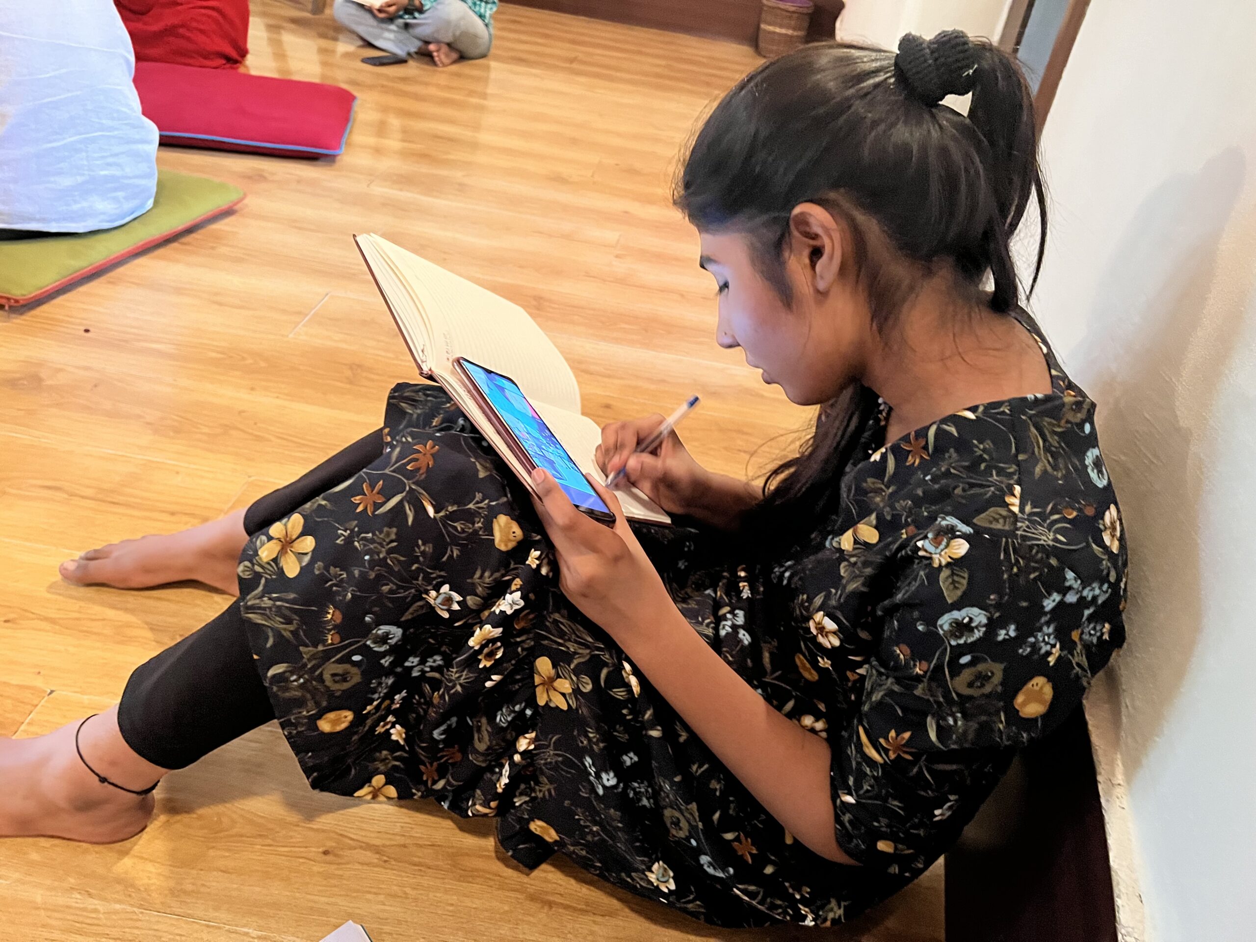 Sandhya Writing the Blue Window Story_Medicine Box@Zroba Writing Retreat. Behind the Scenes. Photo: Lakhmi