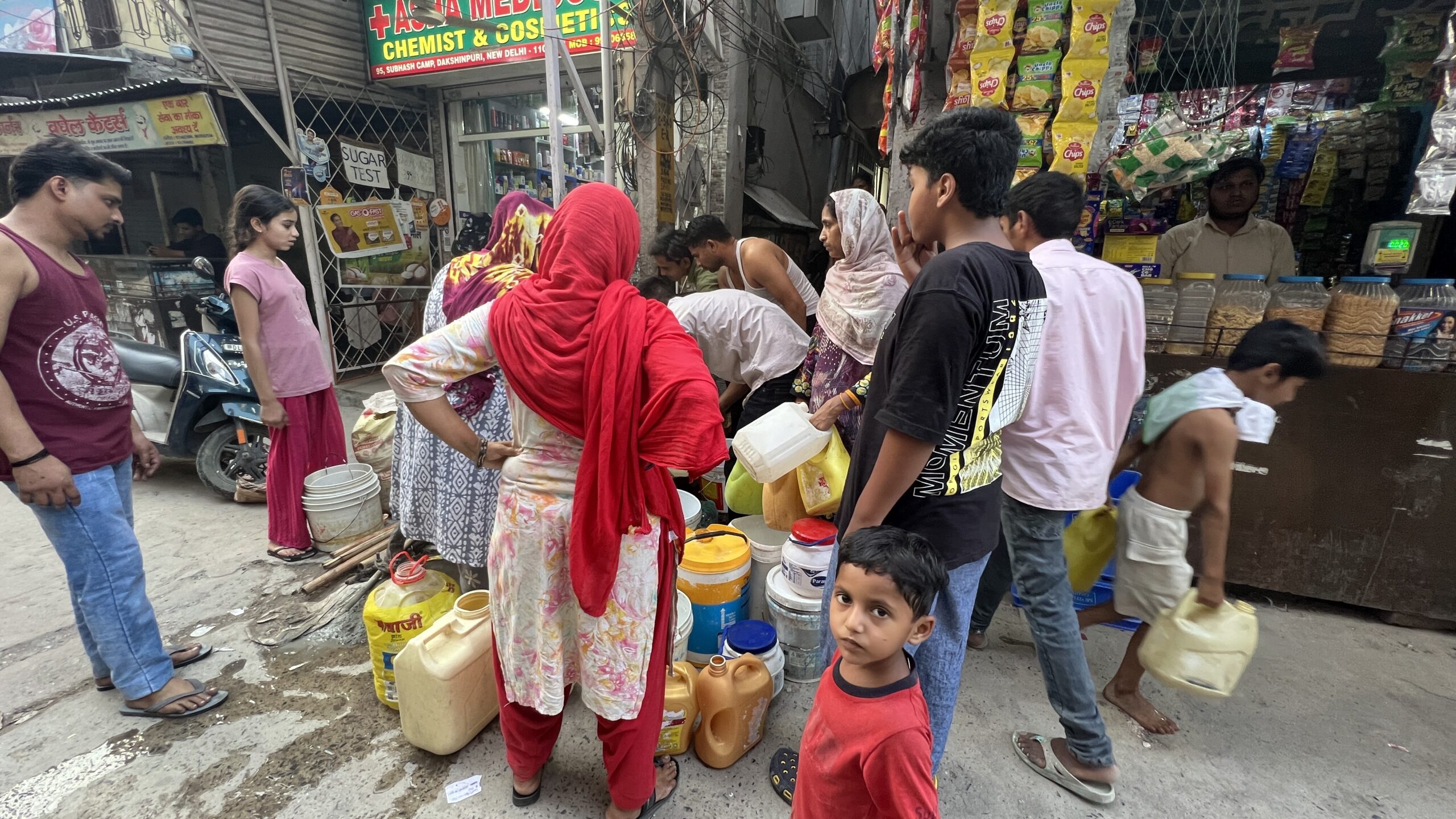 Many households, sometimes an entire lane shares one water connection. Subhash Camp, Dakshinpuri. Summer, 2026. Many households, sometimes an entire lane shares one water connection. Subhash Camp, Dakshinpuri. Summer, 2026.