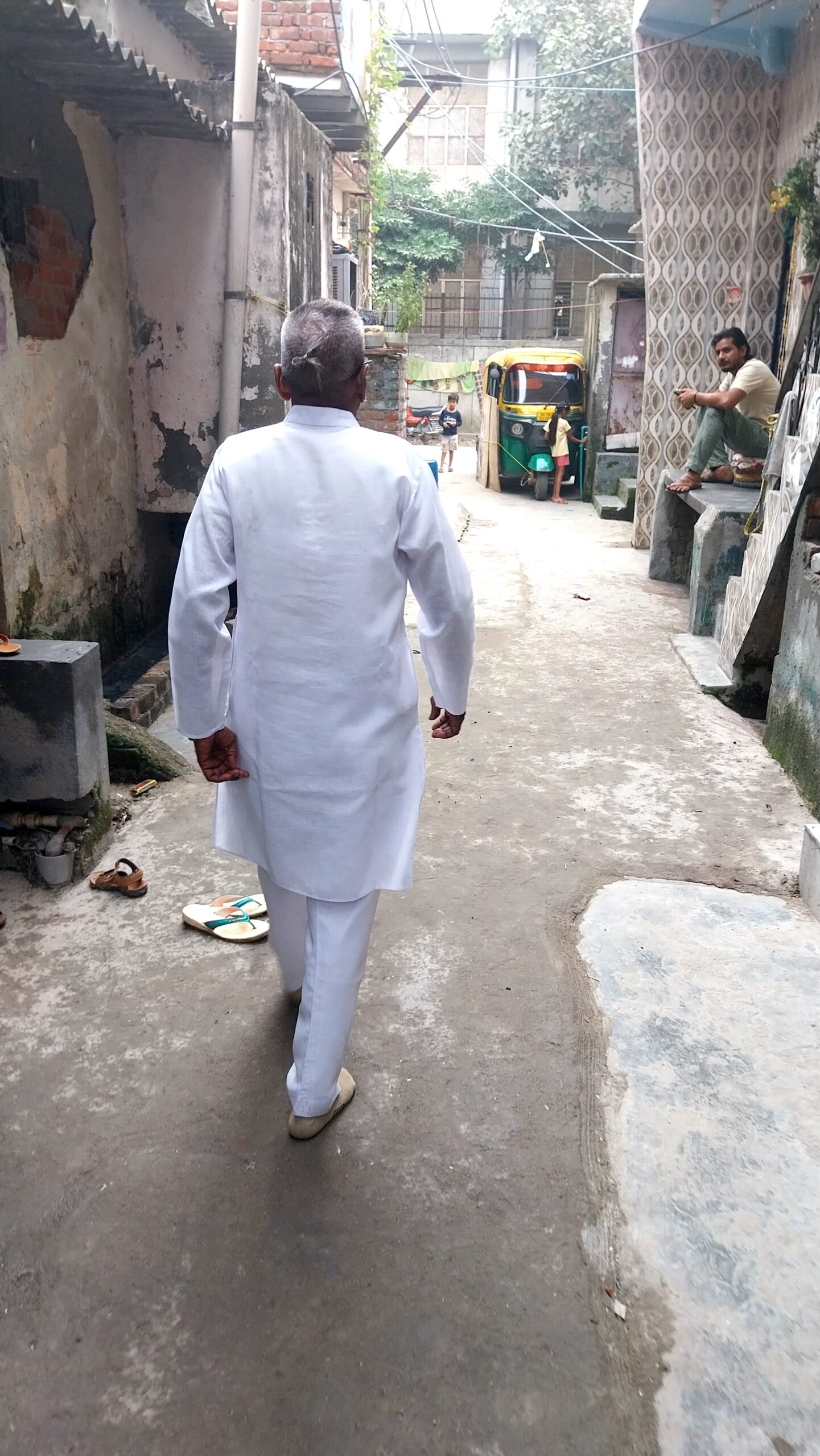 Devi Prasad going to work in his beloved white kurta. Devi Prasad going to work in his beloved white kurta.